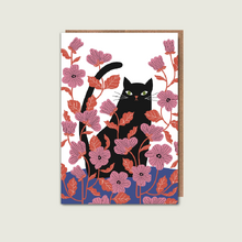 Black Cat in a Floral Garden