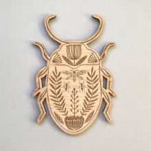 Etched wooden beetle decoration